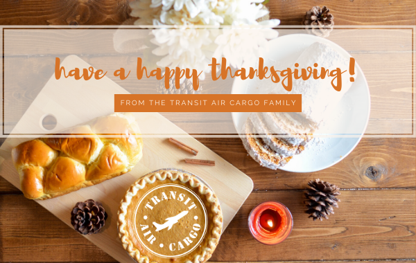 Thanksgiving tablescape with pumpkin pie and the Transit Air Cargo logo