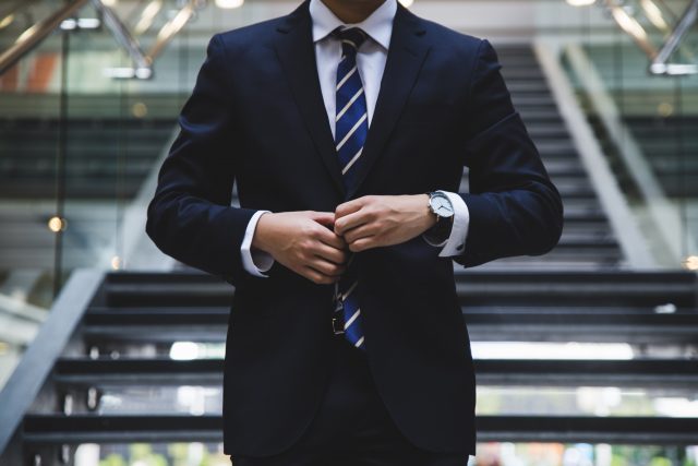 man in business suit in the workplace