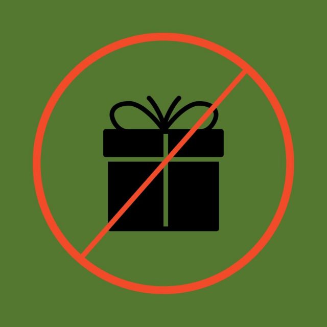 black gift on green background with red circle with slash through it