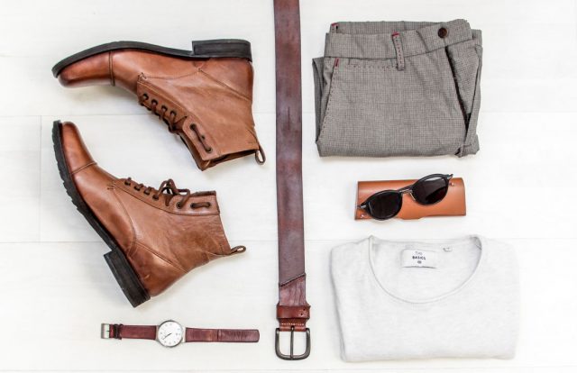 wardrobe flat lay of men's professional clothing and accessories